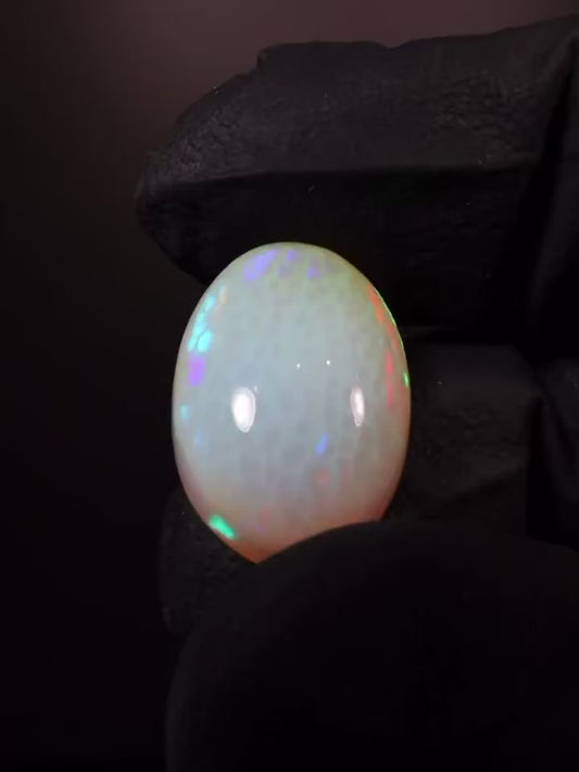 12.63 Ct Natural Oval Honeycomb Ethiopian Cabochon Opal.